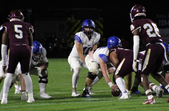 Bartram Trail quarterback Riley Trujillo works from under center during the Bears' playoff win at Niceville.